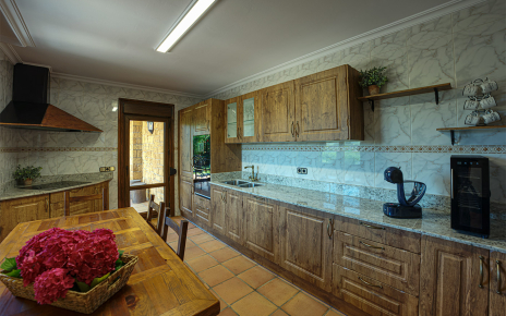 Modern kitchen with direct access to furnished terrace